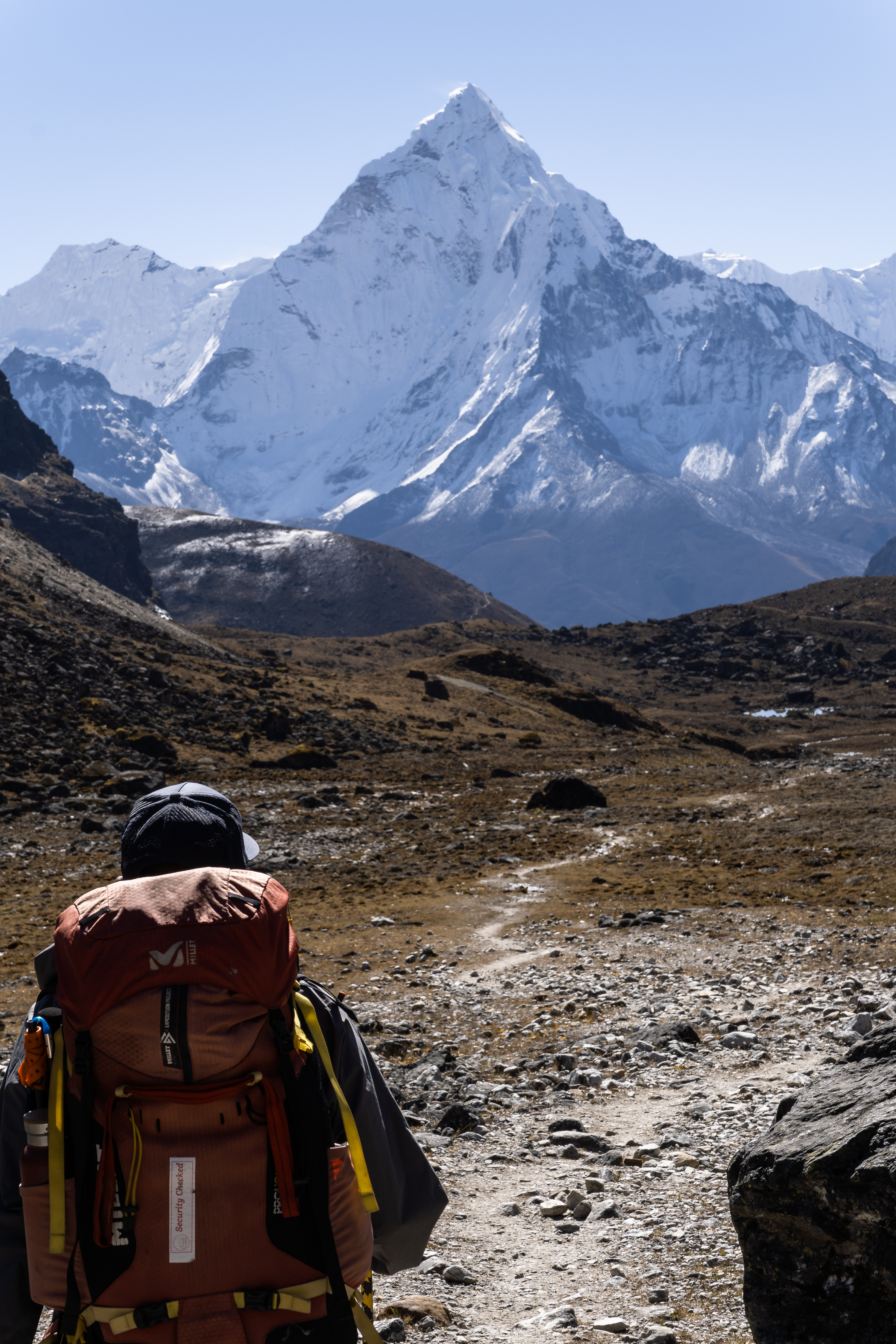 #width=100%;max-width=600px;margin-left=auto;margin-right=auto; Ama Dablam greets us as we descend from the Cho La Pass.